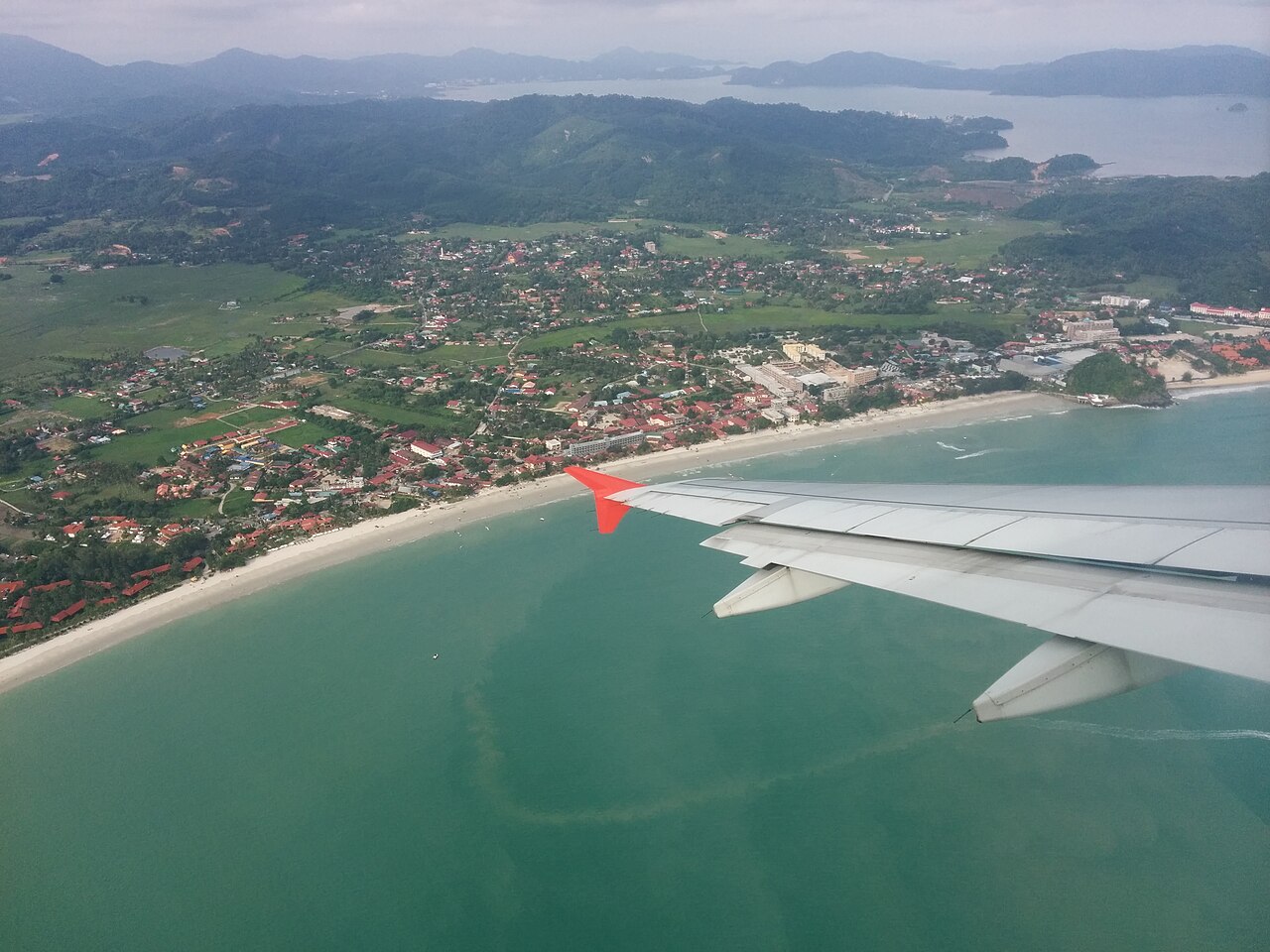 Jalan Pantai Cenang main strip with shops and eateries, Langkawi