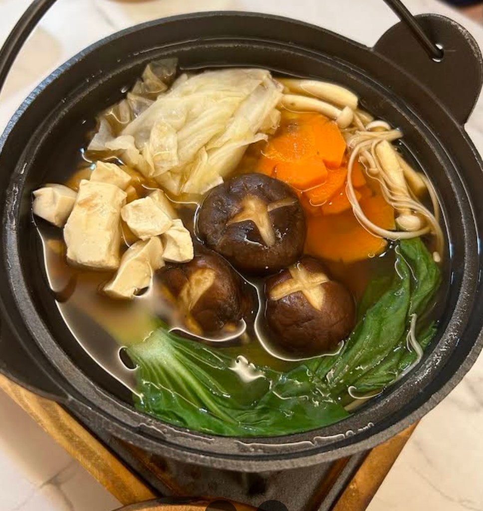 Plant-based Japanese-style hot pot at niàn Cafe with shiitake mushrooms, tofu, bok choy, carrot and enoki in clear broth, Langkawi Kuah